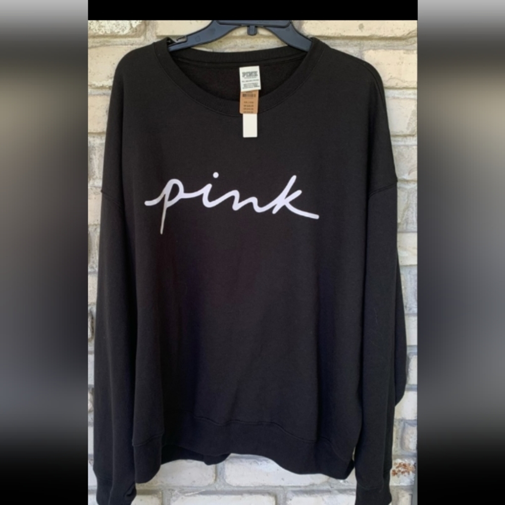 Pink Victoria Secret black sweatshirt.